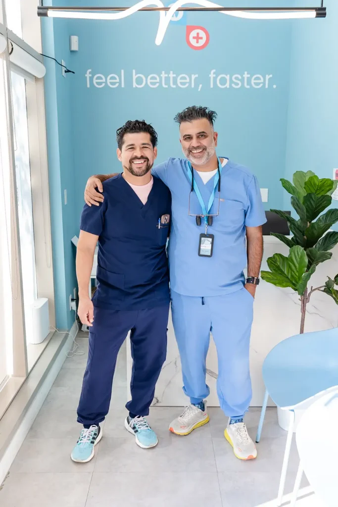 Dr. Harman Mangat and dental assistant at EmergDENT in Toronto, ON.
