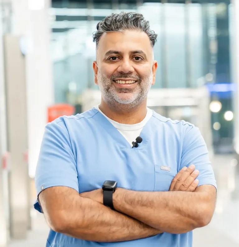 Dr. Harman Mangat, dentist at EmergDENT in Etobicoke, ON.